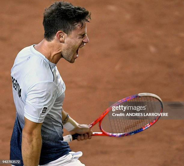 Argentina's tennis player Diego Schwartzman celebrates after defeating Chilean player Christian Garin, during their Davis Cup Americas Zone Group I...