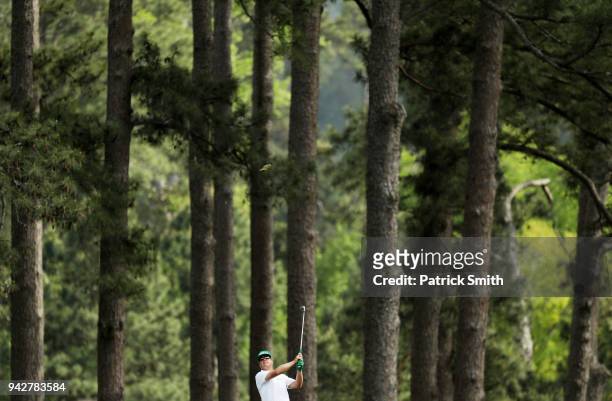 Charley Hoffman of the United States plays a shot on the eighth hole during the second round of the 2018 Masters Tournament at Augusta National Golf...
