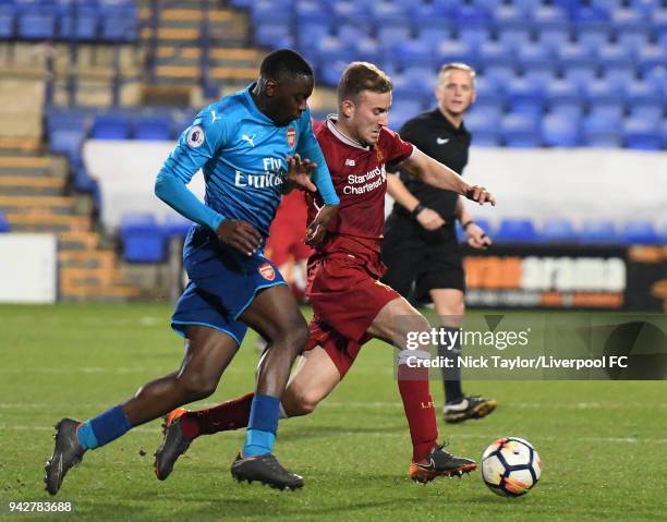 Herbie Kane of Liverpool and Josh Da Silva of Arsenal in action during the Liverpool U23 v Arsenal U23 game at Prenton Park on April 6, 2018 in...