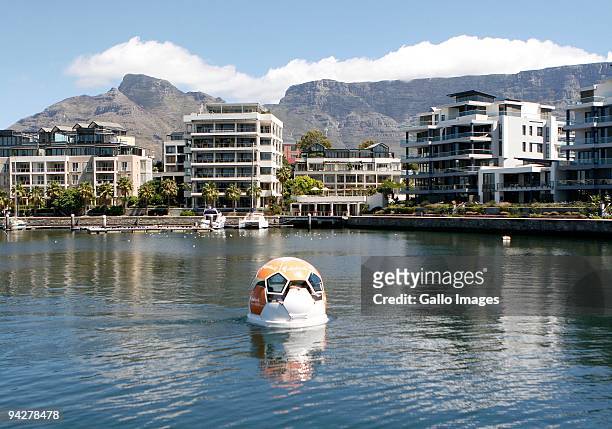 The Orange Whisper Soccer Ball Boat is revealed at the V&A Waterfront in Cape Town on December 10, 2009 in Cape Town, South Africa. The oversized...