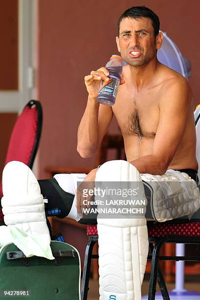 Pakistani cricket captain Younus Khan takes a break during a practice session at The P. Saravanamuttu Stadium in Colombo on July 10 ahead of the...