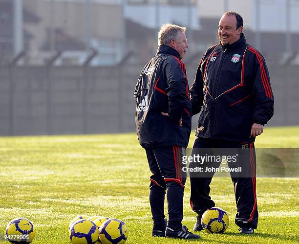 Rafael Benitez manager of Liverpool talks to his assistant Sammy Lee during a team training session at Melwood training ground on December 11, 2009...