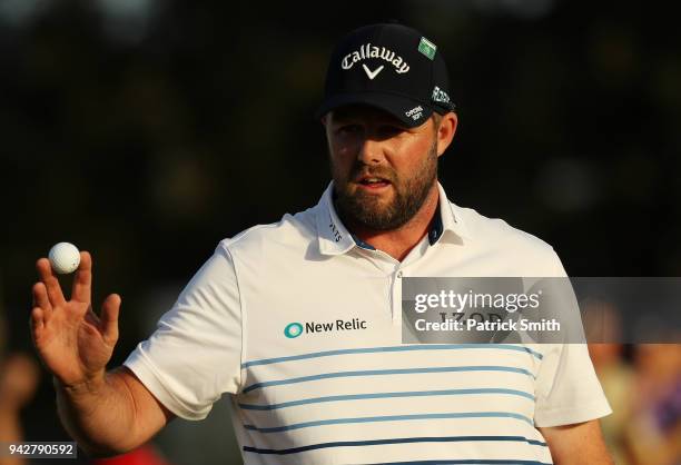 Marc Leishman of Australia acknowledges the crowd on the 18th green during the second round of the 2018 Masters Tournament at Augusta National Golf...