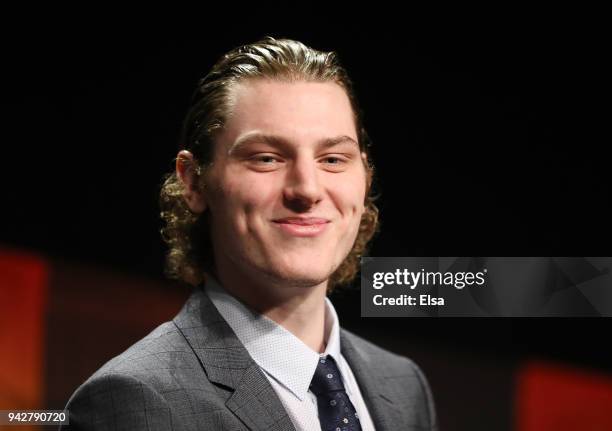 Adam Gaudette of Northeastern University and the Vancouver Canucks smiles after he is announced as the winner of the 2018 Hobey Baker Memorial Award...