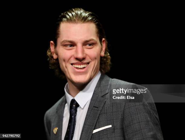 Adam Gaudette of Northeastern University and the Vancouver Canucks smiles after he is announced as the winner of the 2018 Hobey Baker Memorial Award...