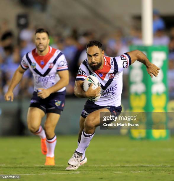 Reece Robinson of the Roosters runs the ball during the round five NRL match between the Cronulla Sharks and the Sydney Roosters at Southern Cross...