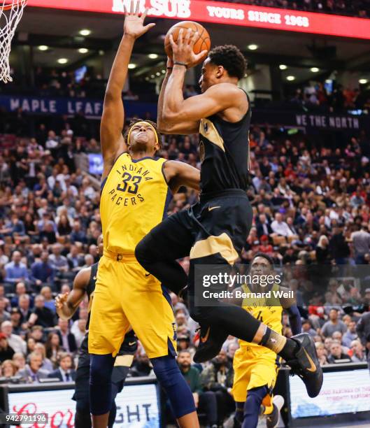 Toronto Raptors guard DeMar DeRozan flies past Indiana Pacers center Myles Turner in the 1st quarter as the Toronto Raptors host the Indiana Pacers...