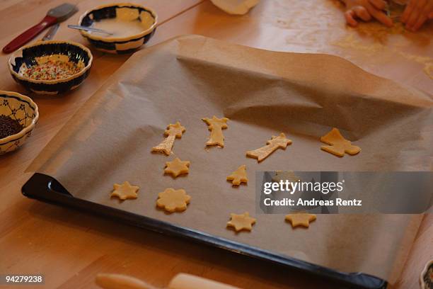 Cut cookies are pictured on a tray at a kindergarten of the Rudolf Steiner Waldorfschule on December 11, 2009 in Berlin, Germany. Each year Berlin's...