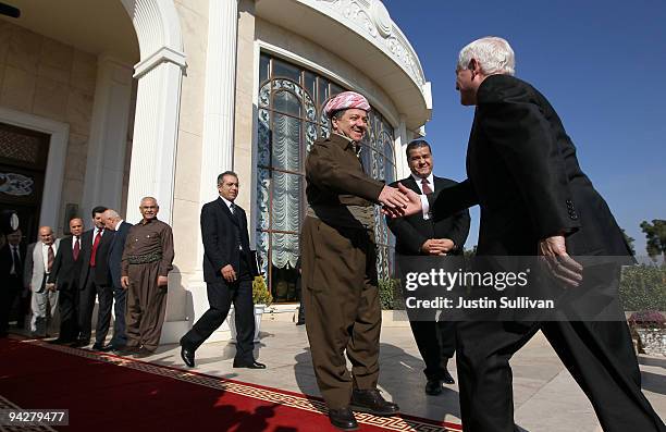 Secretary of Defense Robert Gates greets President of the Kurdistan Regional Government Masud Barzani at his residence December 11, 2009 in Irbil,...