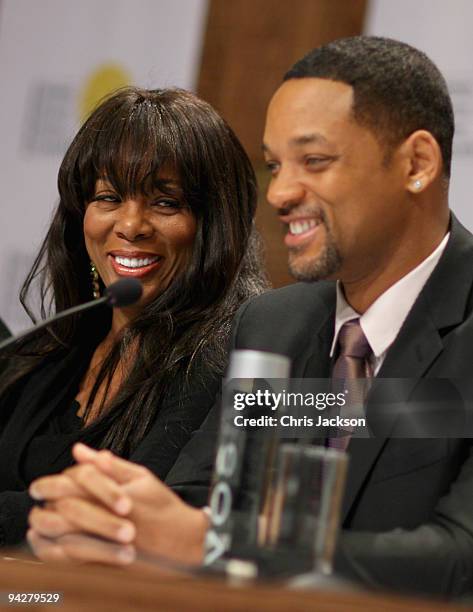 Singer Donna Summer looks on as actor Will Smith hosts a press conference for the Nobel Peace Prize Concert at the Radisson Hotel on December 11,...