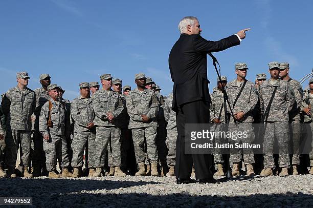 Secretary of Defense Robert Gates speaks to soldiers at F.O.B. Warrior December 11, 2009 in Kirkuk, Iraq. Secretary Gates stopped in Iraq following a...