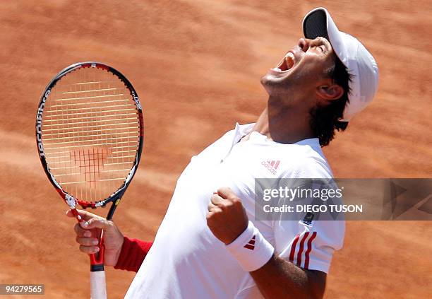 Spanish Fernando Verdasco celebrates after defeating German Andreas Beck during the first Davis cup match Spain vs Germany at Marbella's bullring on...