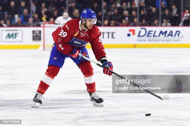 Laval Rocket left wing Jordan Boucher passes the puck during the Springfield Thunderbirds versus the Laval Rocket game on April 6 at Place Bell in...