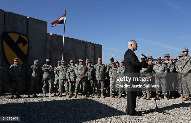 Secretary of Defense Robert Gates speaks to soldiers at F.O.B. Warrior December 11, 2009 in Kirkuk, Iraq. Secretary Gates stopped in Iraq following a...