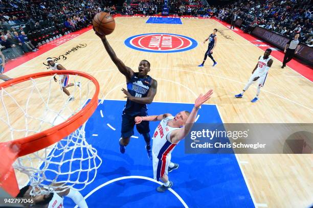 Dorian Finney-Smith of the Dallas Mavericks handles the ball against the Detroit Pistons on April 6, 2018 at Little Caesars Arena in Detroit,...