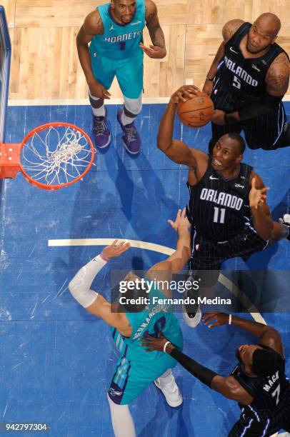 Bismack Biyombo of the Orlando Magic shoots the ball against the Charlotte Hornets on April 6, 2018 at Amway Center in Orlando, Florida. NOTE TO...