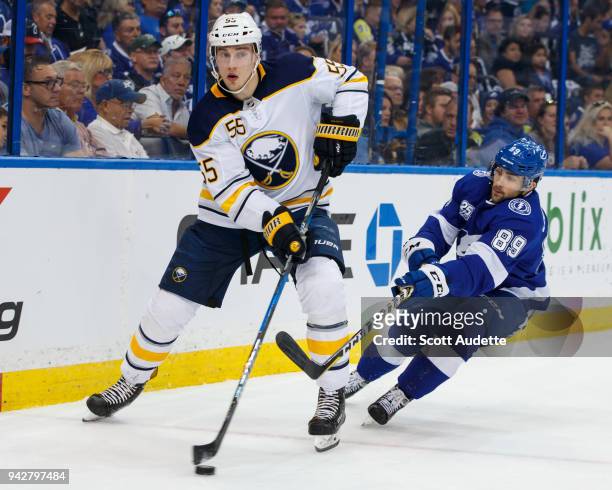 Cory Conacher of the Tampa Bay Lightning skates against Rasmus Ristolainen of the Buffalo Sabres during the first period at Amalie Arena on April 6,...