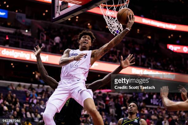 Kelly Oubre Jr. #12 of the Washington Wizards goes to the basket against the Atlanta Hawks during the first half at Capital One Arena on April 6,...