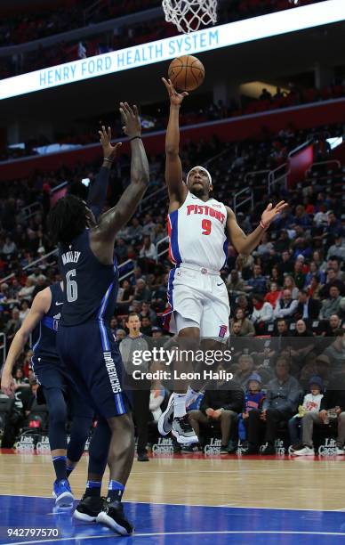 Langston Galloway of the Detroit Pistons shoots the ball as Johnathan Motley of the Dallas Mavericks defends during the second quarter of the game at...