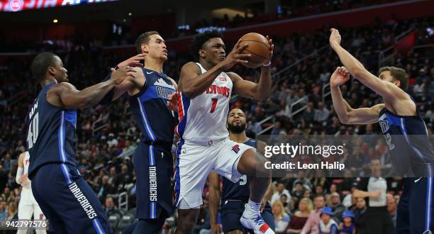 Stanley Johnson of the Detroit Pistons drives the ball to the basket as Dwight Powell of the Dallas Mavericks defends during the second quarter o the...