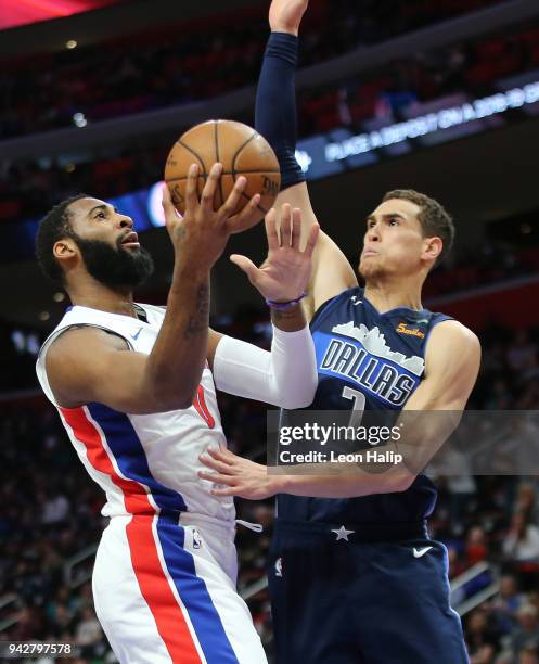 Andre Drummond of the Detroit Pistons drives the ball to the basket as Dwight Powell of the Dallas Mavericks defends during the second quarter of the...