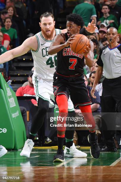 Justin Holiday of the Chicago Bulls looks to pass the ball during the game against the Boston Celtics on April 6, 2018 at the TD Garden in Boston,...