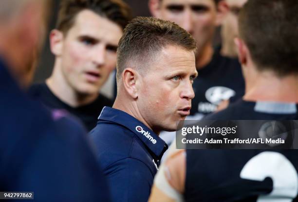 Brendon Bolton, Senior Coach of the Blues addresses his players during the 2018 AFL round 03 match between the Carlton Blues and the Collingwood...