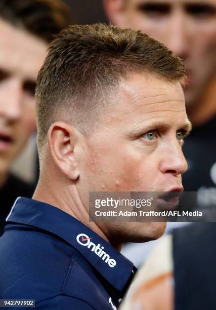 Brendon Bolton, Senior Coach of the Blues addresses his players during the 2018 AFL round 03 match between the Carlton Blues and the Collingwood...