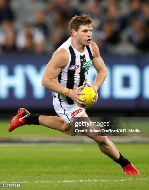 Taylor Adams of the Magpies in action in his 100th game during the 2018 AFL round 03 match between the Carlton Blues and the Collingwood Magpies at...