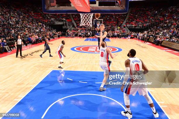 Dwight Powell of the Dallas Mavericks shoots the ball against the Detroit Pistons on April 6, 2018 at Little Caesars Arena in Detroit, Michigan. NOTE...