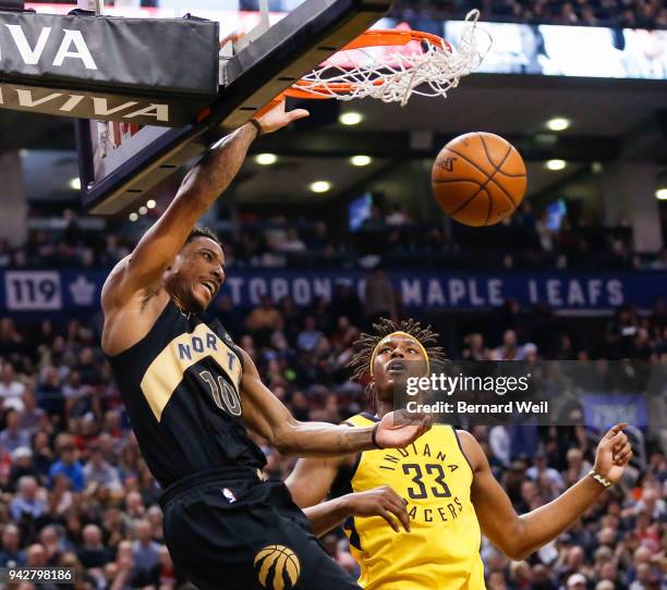 Toronto Raptors guard DeMar DeRozan makes the dunk past Indiana Pacers center Myles Turner in the 2nd quarter as the Toronto Raptors host the Indiana...