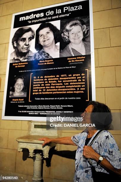 Maria del Rosario de Cerruti observes in the Santa cruz church on November 16 the posters of her friends who were disappeared and killed during the...