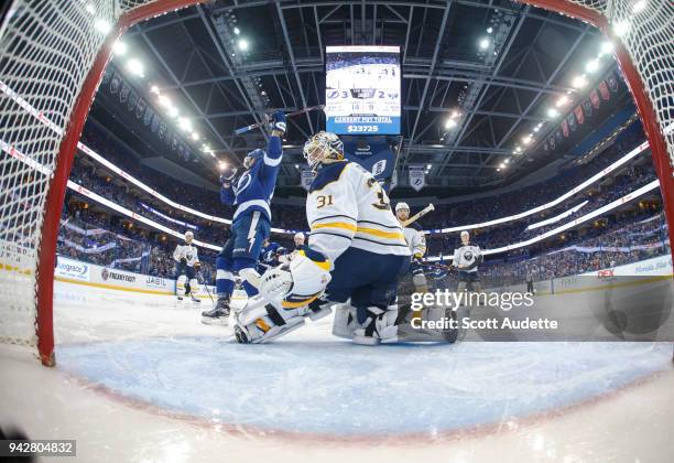 Goalie Chad Johnson of the Buffalo Sabres gives up a goal against Ondrej Palat and the Tampa Bay Lightning during the second period at Amalie Arena...