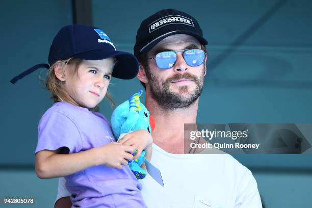 Actor Chris Hemsworth and daughter India Rose Hemsworth attend the swimming on day three of the Gold Coast 2018 Commonwealth Games at Optus Aquatic...