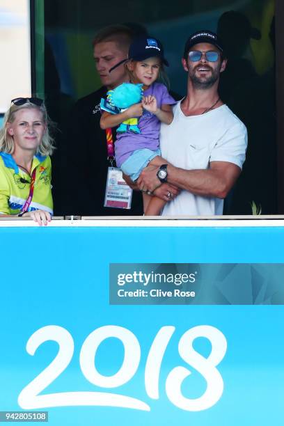 Actor Chris Hemsworth and daughter India Rose Hemsworth attend the swimming on day three of the Gold Coast 2018 Commonwealth Games at Optus Aquatic...