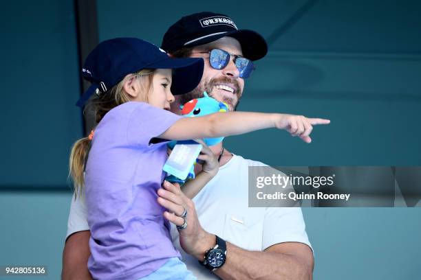 Actor Chris Hemsworth and daughter India Rose Hemsworth attend the swimming on day three of the Gold Coast 2018 Commonwealth Games at Optus Aquatic...