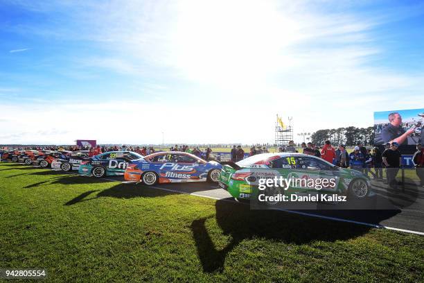 Michael Caruso driver of the Nissan Motorsport Nissan Altima, Andre Heimgartner driver of the Nissan Motorsport Nissan Altima and Rick Kelly driver...