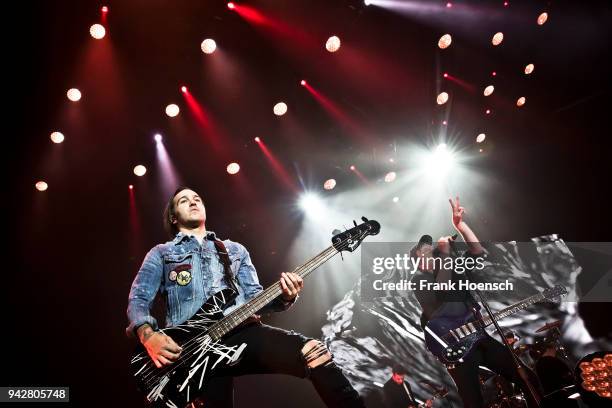 Pete Wentz and Patrick Stump of the American band Fall Out Boy perform live on stage during a concert at the Max-Schmeling-Halle on April 6, 2018 in...
