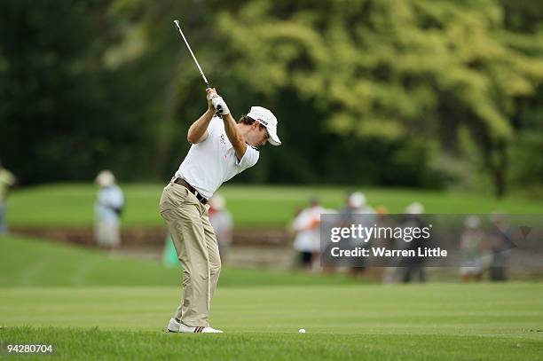 Richard Sterne of South Africa plays his second shot into the ninth green during the second round of the Alfred Dunhill Championship at Leopard Creek...