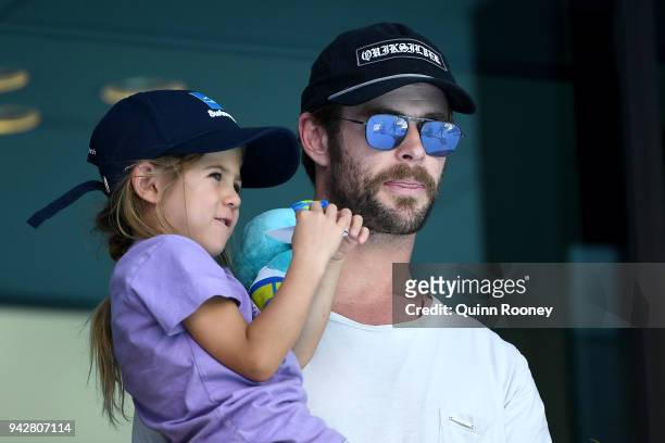 Actor Chris Hemsworth and daughter India Rose Hemsworth attend the swimming on day three of the Gold Coast 2018 Commonwealth Games at Optus Aquatic...