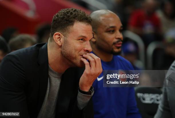 Blake Griffin of the Detroit Pistons watches the action from the bench during the game against the Dallas Mavericks at Little Caesars Arena on April...