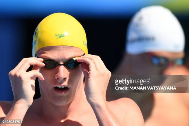 Australia's Jack Cartwright prepares for the swimming men's 100m freestyle qualifications during the 2018 Gold Coast Commonwealth Games at the Optus...