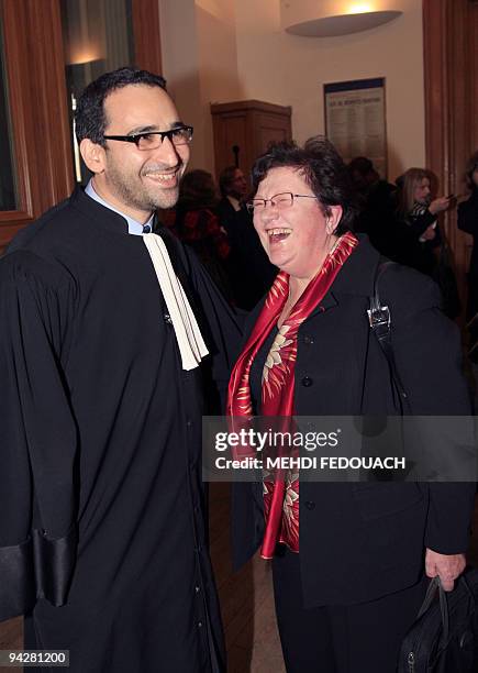 Carmel Colle , the founder of a small firm that manufactures high-end knits, World Tricot, is flanked by her lawyer Pascal Crehange, at the Paris...