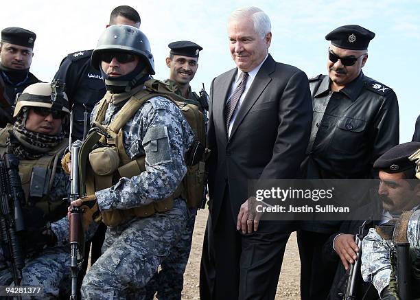 Secretary of Defense Robert Gates meets with members of the Iraqi police at F.O.B. Warrior December 11, 2009 in Kirkuk, Iraq. Secretary Gates stopped...