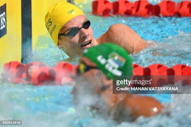 Australia 's Jack Cartwright and South Africa 's Chad Le Clos during the swimming men's 100m freestyle qualifications during the 2018 Gold Coast...