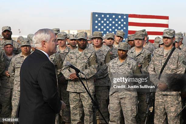 Secretary of Defense Robert Gates speaks to soldiers at F.O.B. Warrior December 11, 2009 in Kirkuk, Iraq. Secretary Gates stopped in Iraq following a...