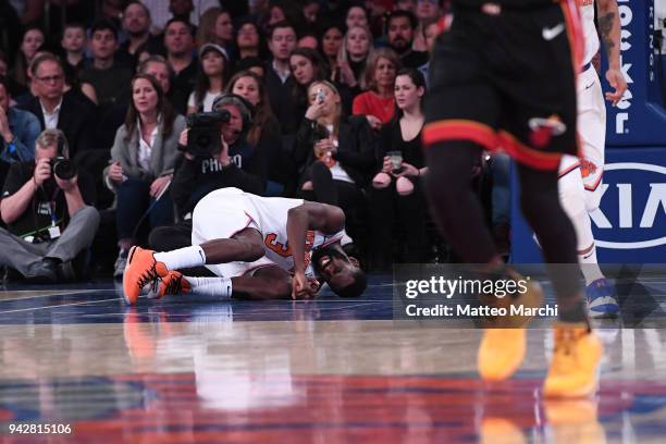 Tim Hardaway Jr. #3 of the New York Knicks gets injured during the game against the Miami Heat at Madison Square Garden on April 6, 2018 in New York...