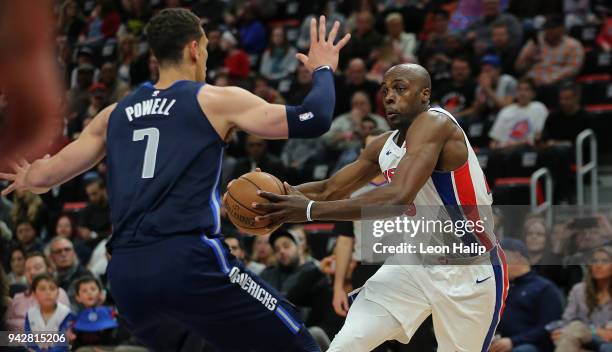 Anthony Tolliver of the Detroit Pistons drives the ball to the basket as Dwight Powell of the Dallas Mavericks defends during the second quarter of...
