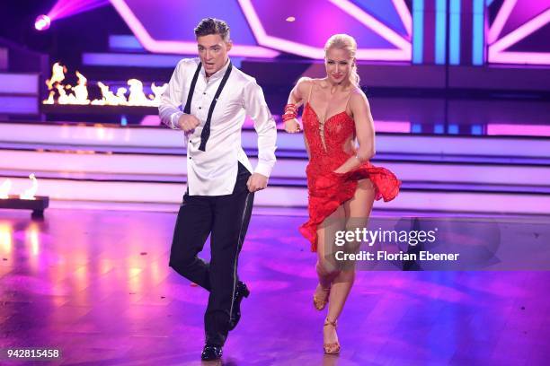 Heiko Lochmann and Kathrin Menzinger perform on stage during the 3rd show of the 11th season of the television competition 'Let's Dance' on April 6,...