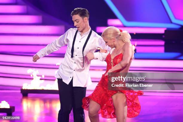 Heiko Lochmann and Kathrin Menzinger perform on stage during the 3rd show of the 11th season of the television competition 'Let's Dance' on April 6,...